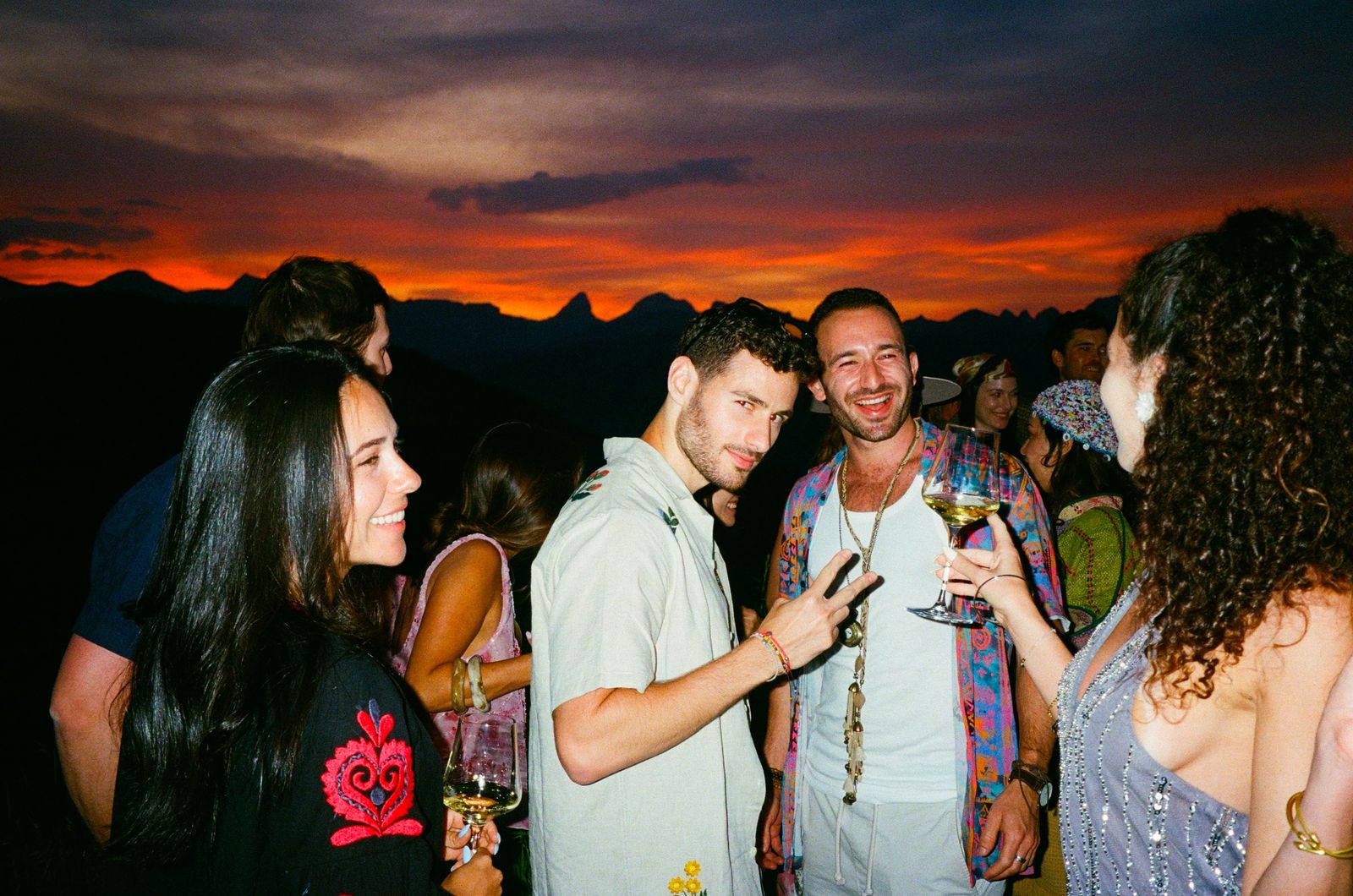 Friends under an orange sky