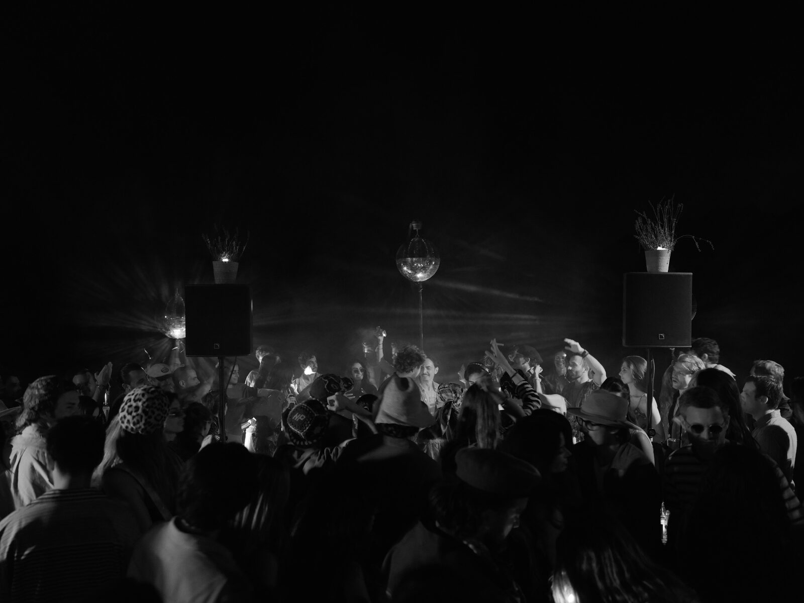 Dancing under the mirror ball at night